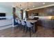 Modern kitchen featuring pendant lighting, bar seating, and stainless steel appliances at 900 Parker Ln, Westfield, IN 46074