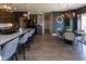 The kitchen features a large island with seating, modern appliances, and view of the dining area at 900 Parker Ln, Westfield, IN 46074