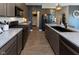 Spacious kitchen features modern appliances, gray cabinets, and ample counter space at 900 Parker Ln, Westfield, IN 46074