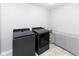 Laundry room featuring new washer and dryer machines and counterspace at 900 Parker Ln, Westfield, IN 46074