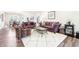 Comfortable living room with plush sofas, stylish decor, and hardwood floors at 9359 Foudray N Cir, Avon, IN 46123