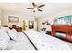 Spacious main bedroom with fireplace, ceiling fan, and en-suite bathroom at 9359 Foudray N Cir, Avon, IN 46123