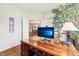Traditional office space with wood flooring, natural light, and a glass-top desk at 9359 Foudray N Cir, Avon, IN 46123