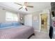 Cozy bedroom with a ceiling fan, and plenty of natural light at 9748 W Sunset Ln, Elwood, IN 46036