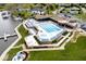 Stunning aerial view of the community pool, clubhouse, and waterfront, showcasing the amenities at 102 Clarendon Dr # 506, Noblesville, IN 46062