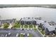 Aerial view of gray apartments by the water with boat docks and parking at 102 Clarendon Dr # 506, Noblesville, IN 46062
