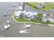 Aerial view of lakeside apartments with parking and multiple boat docks at 102 Clarendon Dr # 506, Noblesville, IN 46062