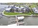Three-story gray apartments featuring multiple patios and boat docks at 102 Clarendon Dr # 506, Noblesville, IN 46062