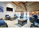 Inviting indoor pool area with comfortable seating and a beautiful wood paneled ceiling at 102 Clarendon Dr # 506, Noblesville, IN 46062