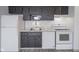 Efficient kitchen with white appliances, dark cabinetry, and marble countertops at 102 Clarendon Dr # 506, Noblesville, IN 46062