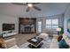 Spacious living room with modern finishes, fireplace, and scenic lake views at 102 Clarendon Dr # 506, Noblesville, IN 46062