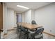 Well lit meeting room features a large table with seating for group gatherings and discussions at 102 Clarendon Dr # 506, Noblesville, IN 46062
