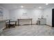 Bright utility room with modern flooring, white cabinets and plenty of workspace at 102 Clarendon Dr # 506, Noblesville, IN 46062