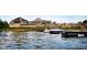 Beautiful waterfront view of the Harbour Trees Beach Club, with boats docked and lush landscaping at 102 Clarendon Dr # 506, Noblesville, IN 46062
