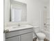 Bathroom featuring a shower and tub combo with a gray vanity and speckled countertop at 10250 Camp Creek Way, Indianapolis, IN 46229