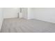 Bonus room featuring a sliding door closet and neutral carpet throughout at 10250 Camp Creek Way, Indianapolis, IN 46229