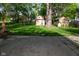Backyard with patio and 2 storage sheds at 112 Coronado Rd, Indianapolis, IN 46234