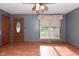 The living room area has a large window that brings in natural light at 112 Coronado Rd, Indianapolis, IN 46234