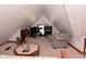 An attic featuring a lounge area and a television at 114 E 27Th St, Indianapolis, IN 46205