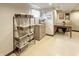 Well-organized basement storage area with shelving and a designated laundry space at 114 E 27Th St, Indianapolis, IN 46205