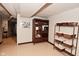 Finished basement includes a display cabinet with epoxy floors and unfinished space at 114 E 27Th St, Indianapolis, IN 46205