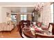 Cozy dining area with a view of the living room, perfect for entertaining guests at 114 E 27Th St, Indianapolis, IN 46205