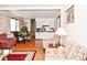 Open-concept living and dining area with hardwood floors and lots of natural light at 114 E 27Th St, Indianapolis, IN 46205
