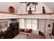 Spacious main bedroom featuring tray ceilings, warm colors, and large windows at 114 E 27Th St, Indianapolis, IN 46205