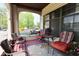 Inviting front porch featuring comfortable seating and a view of the neighborhood at 114 E 27Th St, Indianapolis, IN 46205