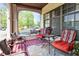 Cozy front porch featuring comfortable seating and a delightful outdoor ambiance at 114 E 27Th St, Indianapolis, IN 46205