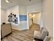 Bright office hallway with comfortable seating, stylish wall decorations, and inviting design at 114 S Walnut St, Muncie, IN 47305