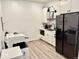 Convenient office area includes a kitchenette with modern appliances and ample counter space at 114 S Walnut St, Muncie, IN 47305