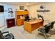 Functional office space featuring a spacious desk, ample storage, and comfortable seating at 114 S Walnut St, Muncie, IN 47305