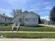 Charming single-Gathering home with a well-maintained lawn and cozy curb appeal at 1203 E 27Th St, Anderson, IN 46016