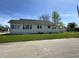 A well-maintained single Gathering home with tidy lawn and clear windows at 1203 E 27Th St, Anderson, IN 46016