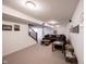 Finished basement with carpet, a large couch, 2 tables, stairs, and wall decor at 12493 Loudoun Pl, Fishers, IN 46037