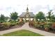 Charming community gazebo surrounded by lush landscaping and inviting walking paths at 12493 Loudoun Pl, Fishers, IN 46037