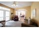Inviting living room features lots of light, neutral walls, carpet, and open access to the dining room at 12493 Loudoun Pl, Fishers, IN 46037