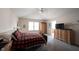 Spacious main bedroom features neutral walls, carpet, and a large window allowing natural light to fill the space at 12493 Loudoun Pl, Fishers, IN 46037