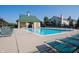 Sparkling community pool with inviting lounge chairs and a charming covered area for residents at 12493 Loudoun Pl, Fishers, IN 46037