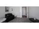 Cozy sitting room with neutral carpet, a reading chair, and a view to the closet at 12493 Loudoun Pl, Fishers, IN 46037