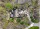 Aerial shot reveals a large lot with a home, back deck, fire pit area and private driveway at 12608 E 86Th St, Indianapolis, IN 46236