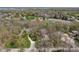 Sprawling property nestled among lush trees, showcasing a peaceful and private setting at 12608 E 86Th St, Indianapolis, IN 46236
