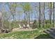 Charming fire pit area with Adirondack chairs is ideal for outdoor gatherings and enjoying nature at 12608 E 86Th St, Indianapolis, IN 46236