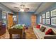 Game room featuring a foosball table, comfortable seating, and view into the kitchen area at 12608 E 86Th St, Indianapolis, IN 46236
