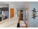 A kitchen with dark cabinetry, stainless steel appliances, granite countertops, and wood floors at 12608 E 86Th St, Indianapolis, IN 46236