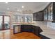 Modern kitchen featuring dark cabinets, stainless steel appliances, and granite countertops at 12608 E 86Th St, Indianapolis, IN 46236