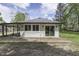Charming home featuring a spacious backyard and a lovely wooden deck at 1301 Stafford Rd, Plainfield, IN 46168