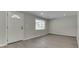Bright entryway with a decorative glass front door and neutral walls, creating a welcoming first impression at 1301 Stafford Rd, Plainfield, IN 46168