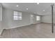 Bright living area with hardwood floors, recessed lighting, and natural light, offering a welcoming space at 1301 Stafford Rd, Plainfield, IN 46168